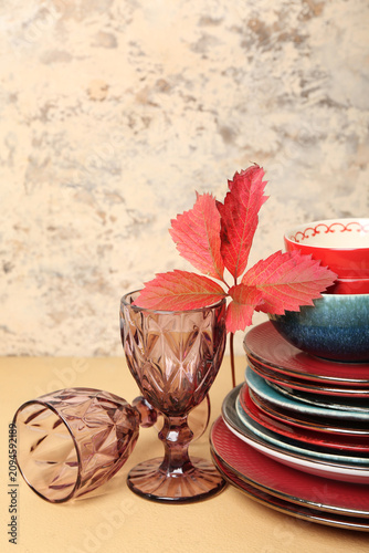 Stack of dishes with autumn...