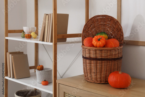 Pumpkins in basket on chest...