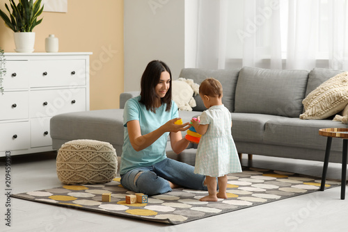 Little baby girl learning t...