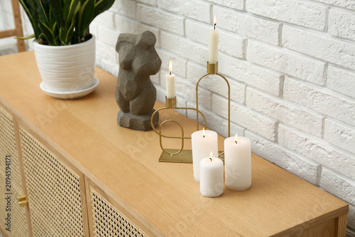 Burning candles with figuri...