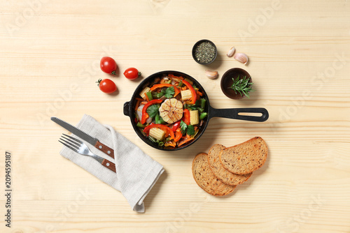 Frying pan with tasty veget...