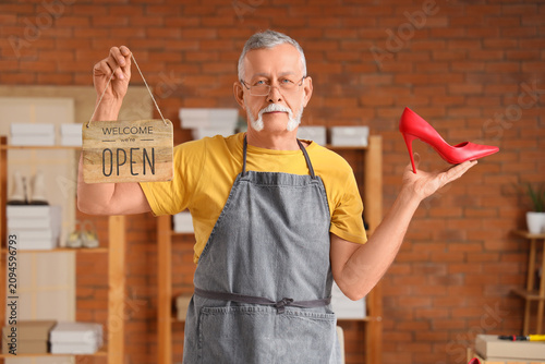 Mature shoemaker with OPEN ...