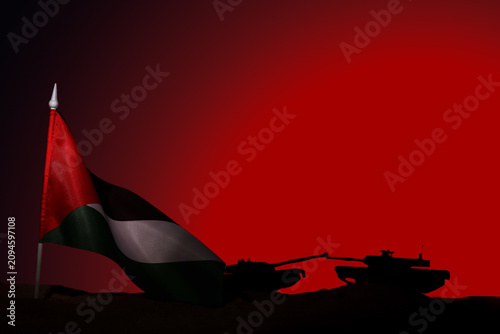 Foto Silhouette of tanks with flag of Palestine on sand against red background