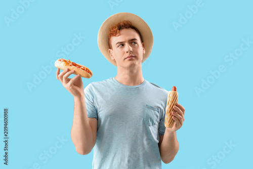 Thoughtful young man with t...