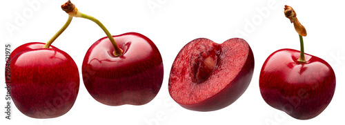 Fresh ripe cherries and a sliced cherry isolated on a white background