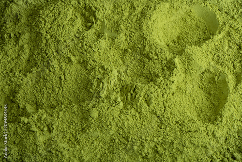 Matcha tea, matcha powder as a background.