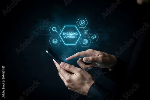 Businessman using smartphone to interact with digital engaging content marketing icons