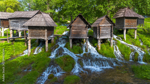 Aerial View of Historic Pliva Wooden Watermills on Waterfalls in Jajce Bosnia and Herzegovina