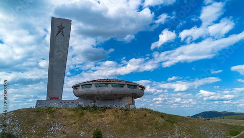Photos Aerial view of the abandoned communist buzludzha monument on a hill under a blue