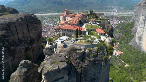 Aerial view of the Holy Trinity Monastery grounds on a high rock formation in Meteora Greece