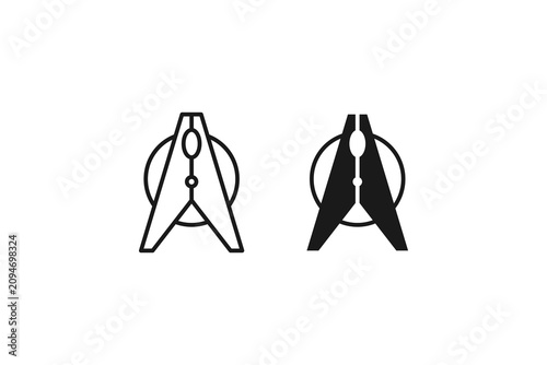 classic clothes pin clothespin for hanging wet laundry line art and silhouette black symbol