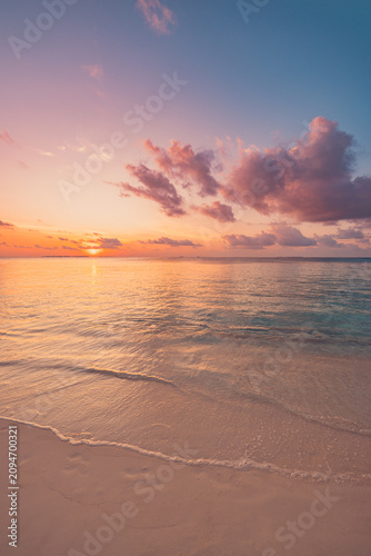 Dreamy pastel sunset beach, calm tropical sea, soft glowing sky. Beautiful tranquil nature seascape, peaceful relaxing evening shore. Meditation wellbeing background, serene nature wallpaper design
