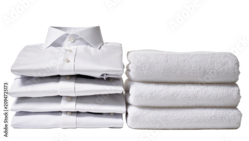 Konstfotografi Isolated stack of neatly folded clean white dress shirts and fluffy towels ready