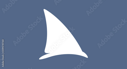 Fotografie White shark fin silhouette on blue background