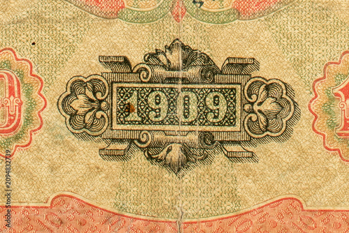 Detail of a 19th-20th century paper bill, macro shot.