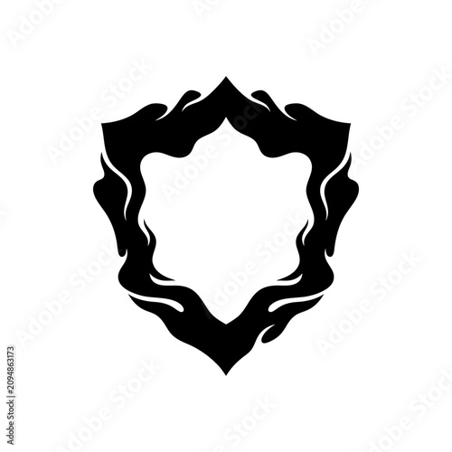 Abstract shield emblem with ornate flowing flame style border silhouette abstract heraldry protection medieval decorative monochrome isolated