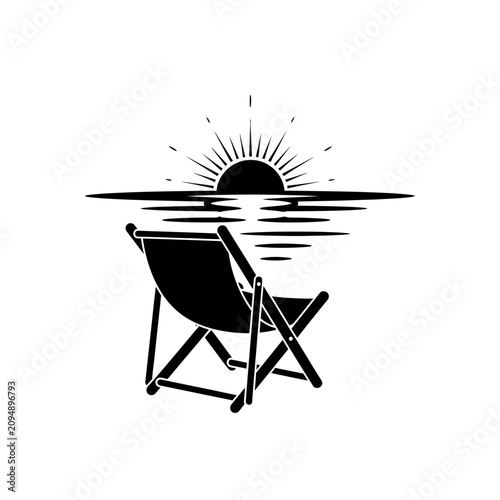 Konstfotografi Black beach chair facing sunset.