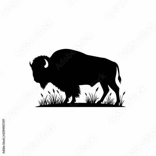 Fotografi Black silhouette of bison standing in grass with against white background illust