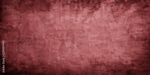 Фотография A textured, deep red background with a grunge-like, weathered concrete surface, evoking a sense of raw, industrial, or historical ambiance