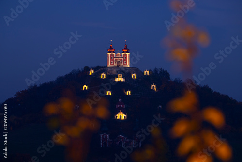 Baroque Calvary on hilltop in Banska Stiavnica at night