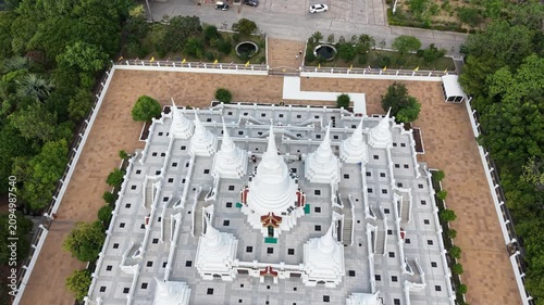 Wat Asokaram. Aerial drone footage of Phra Thutangkha Chedi at Wat Asokaram in Samut Prakan Thailand. Aerial view Thai landmark or travel destination for tourist who seeing Thai architecture culture.