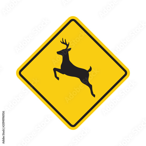 Yellow diamond warning sign with black silhouette of jumping deer
