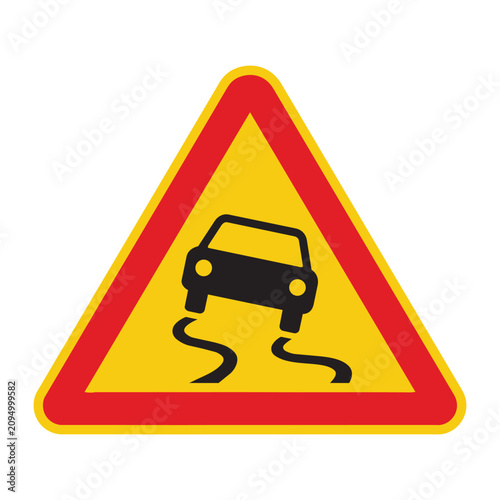 Yellow triangular warning sign with skidding car icon
