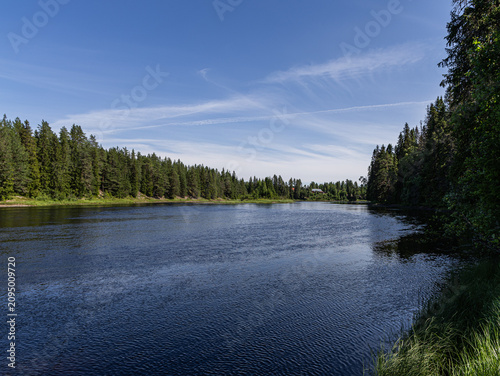 Västerdalälven River in Sweden With Wispy Summer Clouds