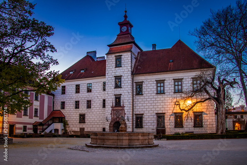 An evening shot of a beautiful and romantic chateau.