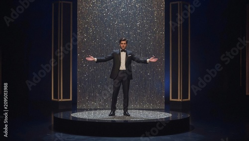 Performing Artist Showcases Talent on Stage in Spotlight During Evening Show