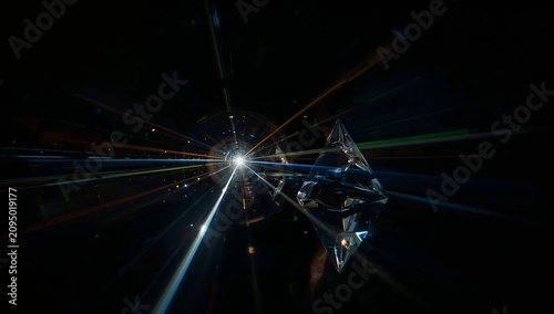 Light Travels Through a Prism Creating Various Colors in Dark Space With a Br...