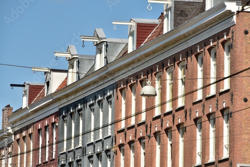 Photography Façades de maisons typiques avec crochets tout en haut à Amsterdam (Nederland)