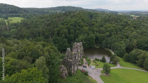 Aerial Orbit From Distant Externsteine Spire View