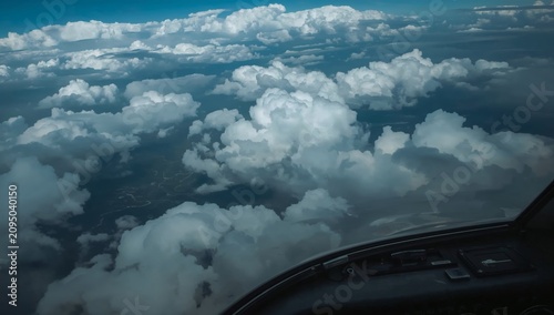 View of Clouds From an Airplane Cockpit During a Flight Over a Blue Sky With ...