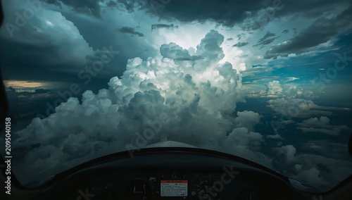 View of Clouds From an Airplane Cockpit During a Flight Over a Blue Sky With ...