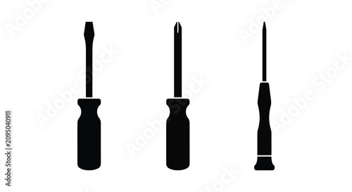 фотографія Three screwdrivers with varying head types in a black silhouette screwdriver fla