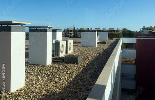 фотографія Air conditioning (HVAC) installed on the roof of industrial buildings