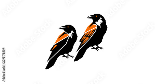 Two black and orange birds perched side by side.