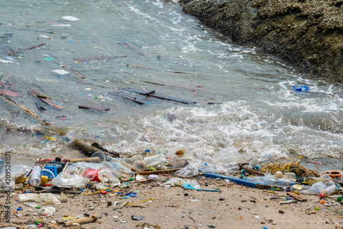 Cuadro en lienzo Polluted beach with plastic waste and garbage washed up on the shore, environmen