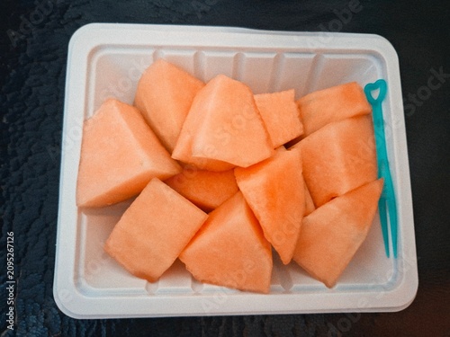 Принти на полотні Sweet orange melon chunks as a healthy fresh fruit snack to go