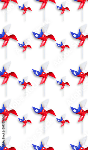Pinwheels in a repeating pattern displaying red, white, and blue colors with stars
