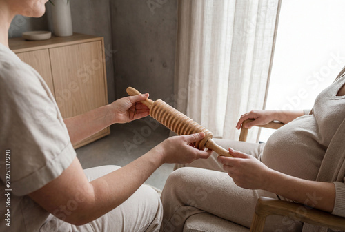 Professional Maderotherapy Session Using Wooden Roller On Pregnant Woman For Prenatal Wellness