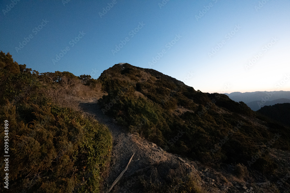 Fototapeta premium Mount Jade trekking route and summit scenery in Yushan National Park, Taiwan