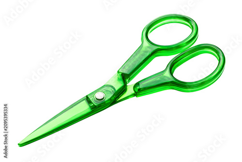 Hair-cutting green scissor handle plastic stainless steel isolated on cutout PNG or transparent background. Professional hairstyling tools. Polished metallic finish premium craftsmanship against.