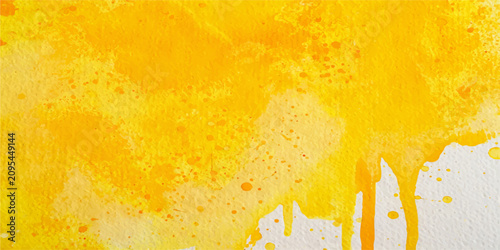 Bright yellow orange watercolor abstract texture background with vibrant paint splash artistic design for creative decorative projects