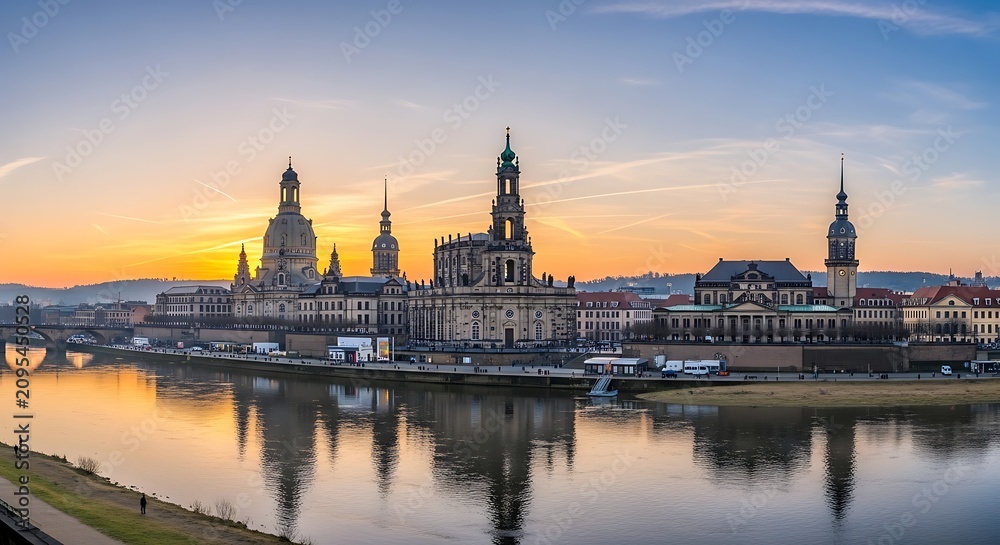 Fototapeta premium Panoramic View of Historic City Skyline During Sunset.