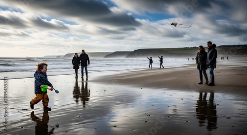 People Walking and Playing on a Scenic Beach Coastline.