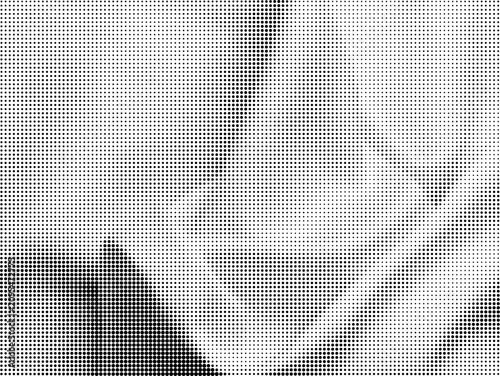 Abstract halftone dot texture background with geometric circular pattern in monochromatic black and grey gradient design elements.