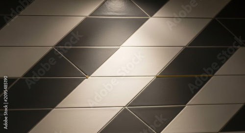 Geometric Diagonal Patterned Black And White Tiles With Dramatic Lighting