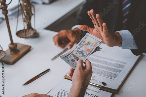 Fotografie Professional refusing money, declining bribery and corruption